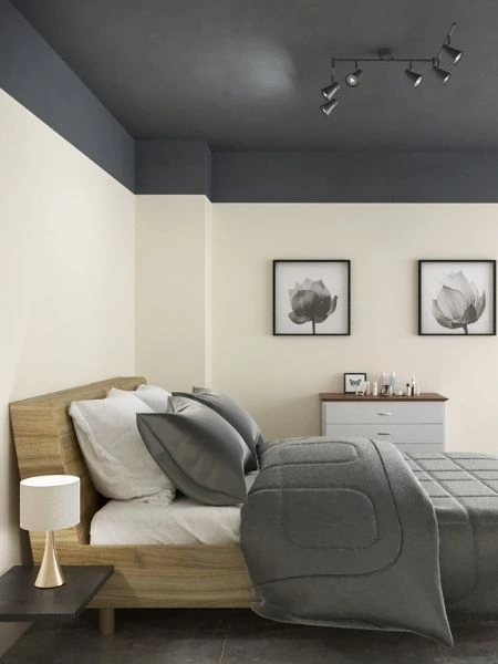 Pintura para quarto branco com teto cinza e cama posta cinza.