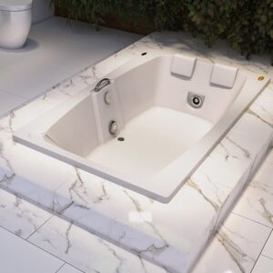 Banheira Jacuzzi retangular embutida e revestida por azulejos.