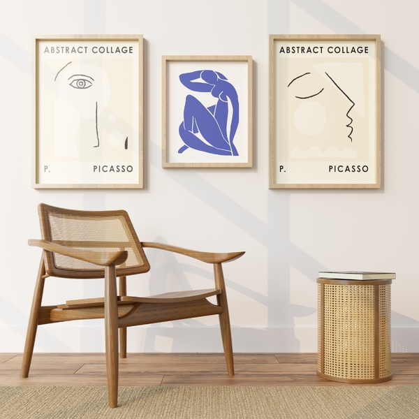 Composição de quadros: sala com posters do Picasso